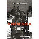 A RAS DE SUELO (PEQUEÑA MARCA EN PORTADA)